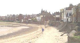 View along West Bay sandy beach at North Berwick, with houses backing onto the beach