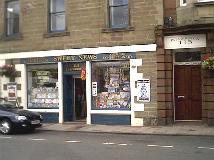 Sweet news - Tobacco, confectionery and speciality greetings cards. Palmerston 115 doorway on the right