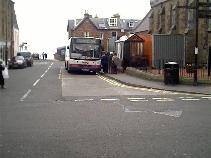 Bus stop beside the church, catch the bus here to Edinburgh