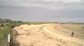 The grass on the left is an opportunity to sit and watch the sea at North Berwick